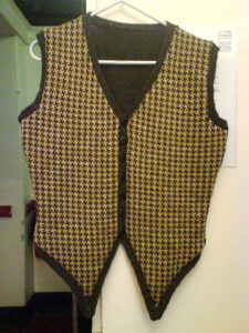 Machine Knit mans waistcoat designed by Gloria