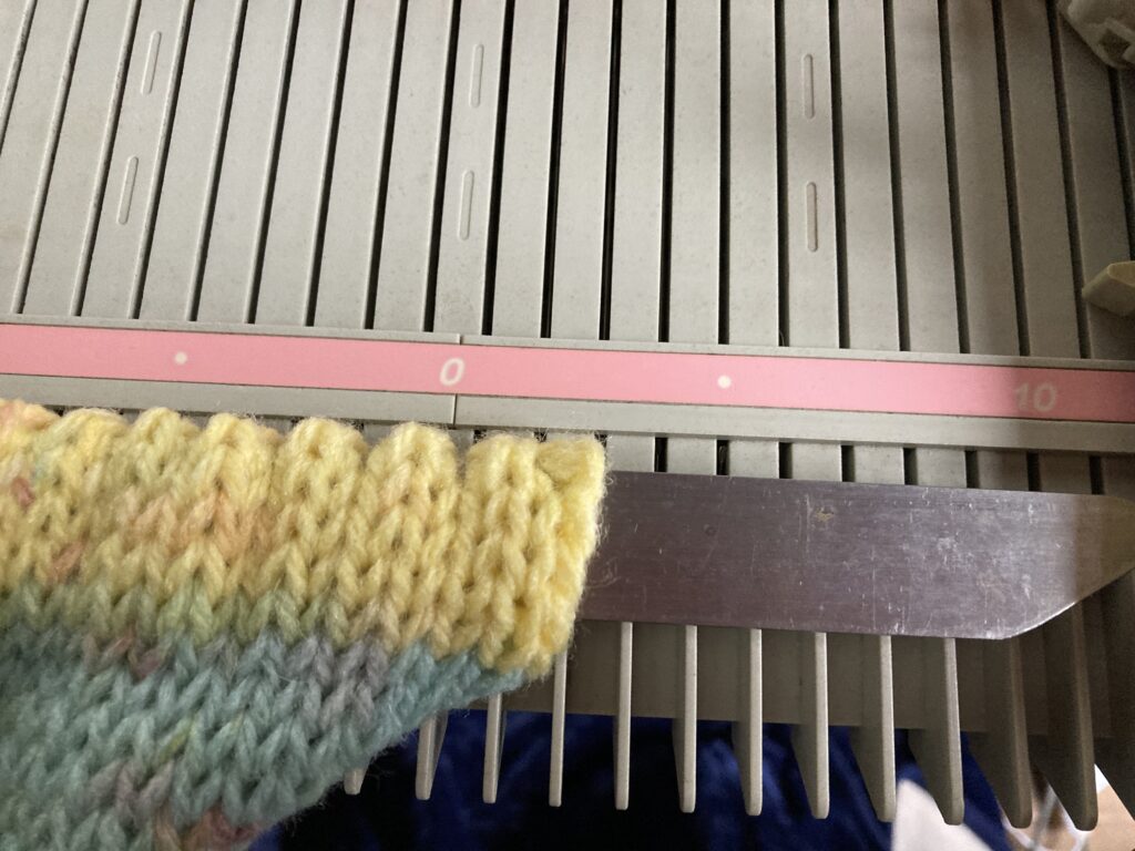 pulling hem using a metal ruller